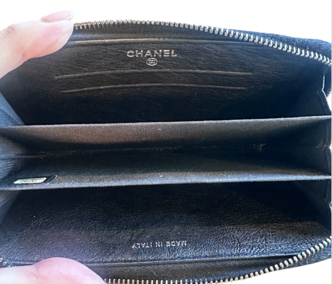CHANEL Black Quilted Studded Medium Zippy Wallet