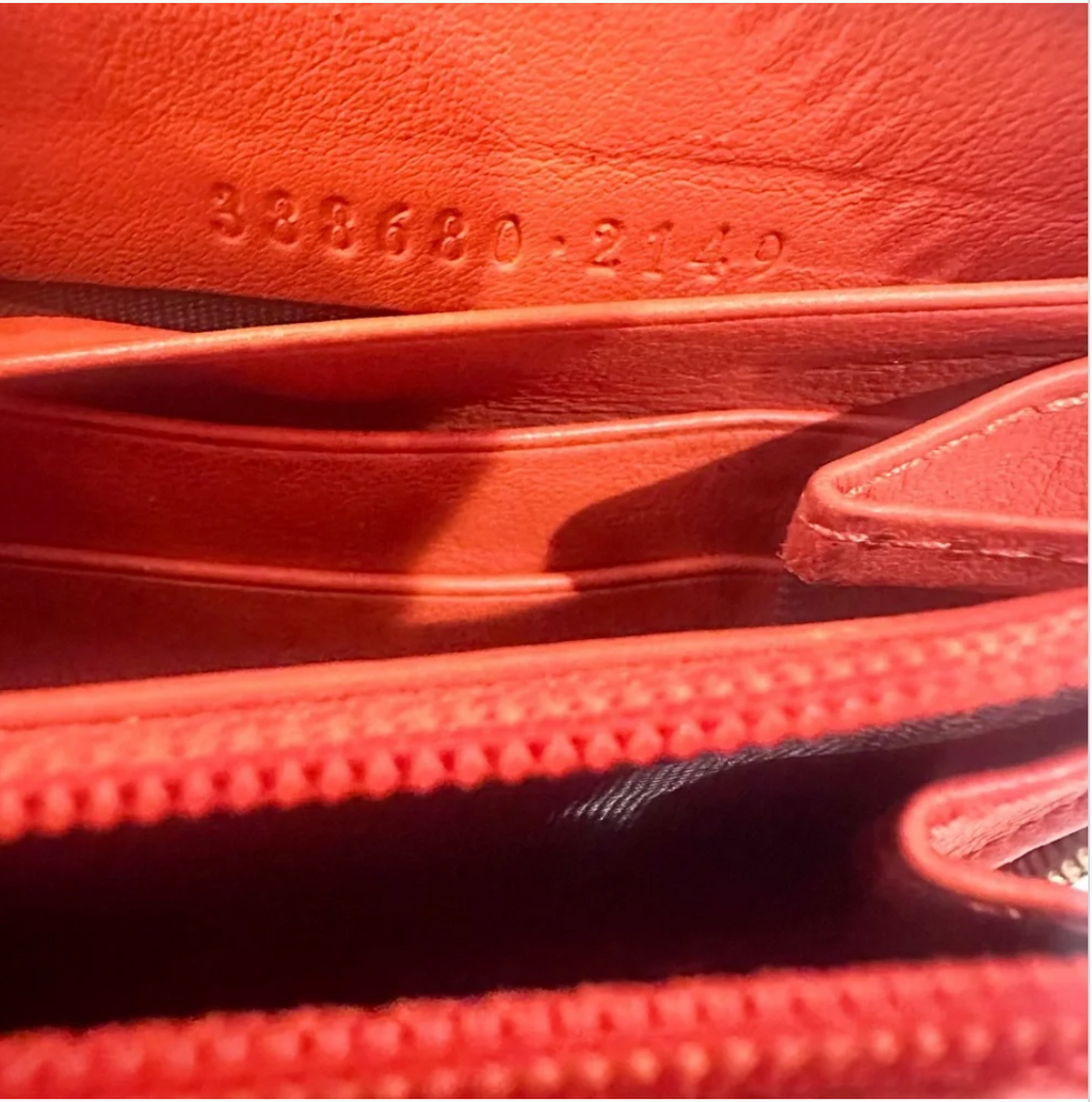 Gucci GG Supreme Ribbon Zippy Wallet